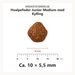 Kroketstørrelse for Dr. Clauder's Hvalpefoder Junior Medium med Kylling: ca. 10 × 5,5 mm vist ved en mm-lineal.